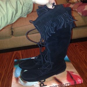 Minnetonka moccasin knee high boots.