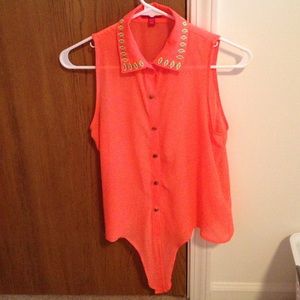 Size small neon orange blouse!