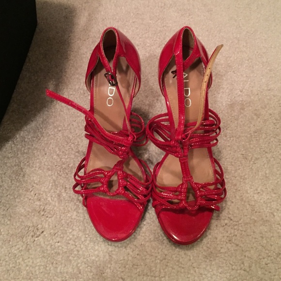 Aldo, bright red patent, size 6. Super sexy!