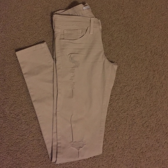 Light khaki distressed super skinny jeans