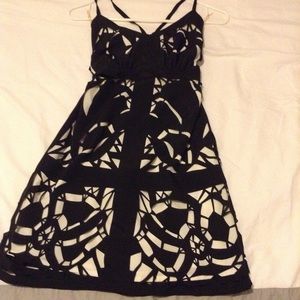 Unique boutique dress. Black cut out overlay