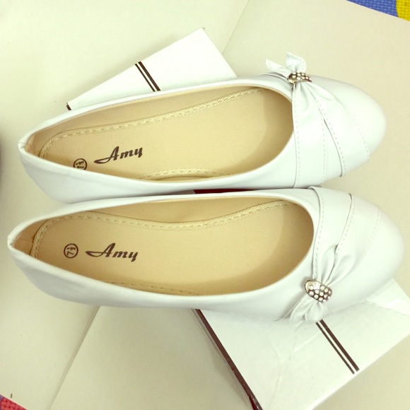 Flat white shoes