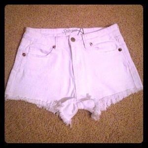 Never worn, white studded shorts.