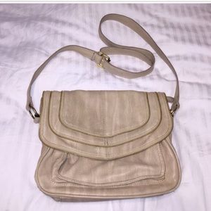 Tan cross-body free people purse