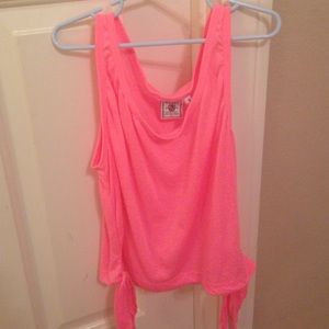 Pink shirt with ties at the bottom