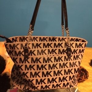 Brown and black Michael Kors bag