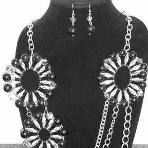 Floral medallion necklace and earring set