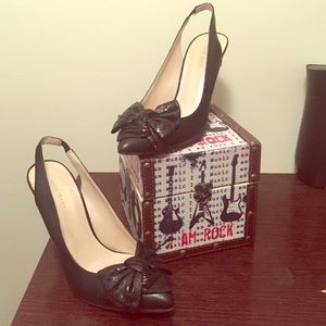 Black heels with a bow