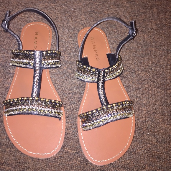 Never worn before. sz 6.5. Very cute sandals