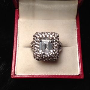 Emerald cut CZ center stone w/ 3 row halo on 925