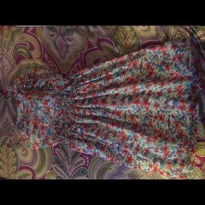 Floral dress. Small, but more of a Medium size.