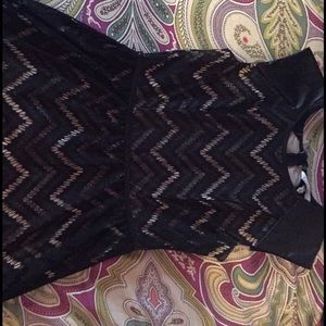 Black lace dress. Large on tag, more of a medium.