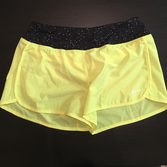 Neon yellow Nike running shorts