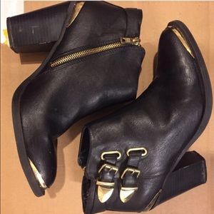 Gold and black heeled boots