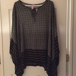 Black and white, thin, light weight poncho.