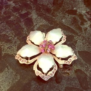 Pink flower brooch.