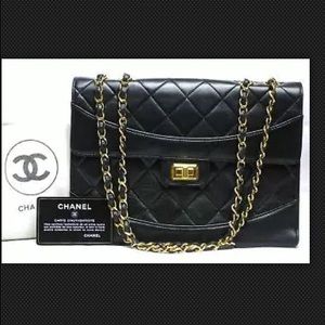 CHANEL quilted black lambskin 2.55 chain bag
