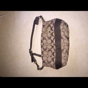 Brown and tan coach purse