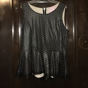 Black and flower patterned peplum top