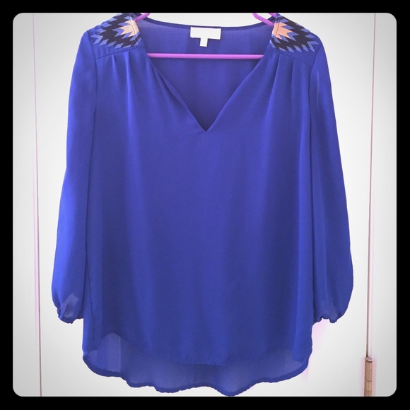 Royal blue blouse with Aztec pattern on shoulders!