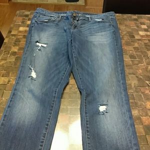 Midrise distressed skinny jeans