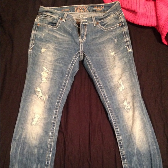 Buckle black skinny jeans