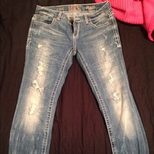 Buckle black skinny jeans