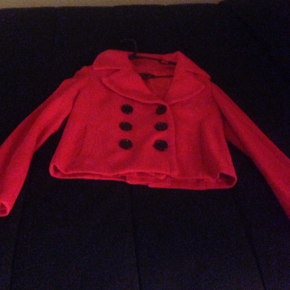 Red jacket with black buttons