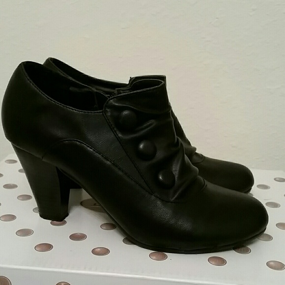 Black zip up boots.