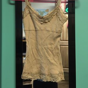 Tan tank top with lace on the trimmings!