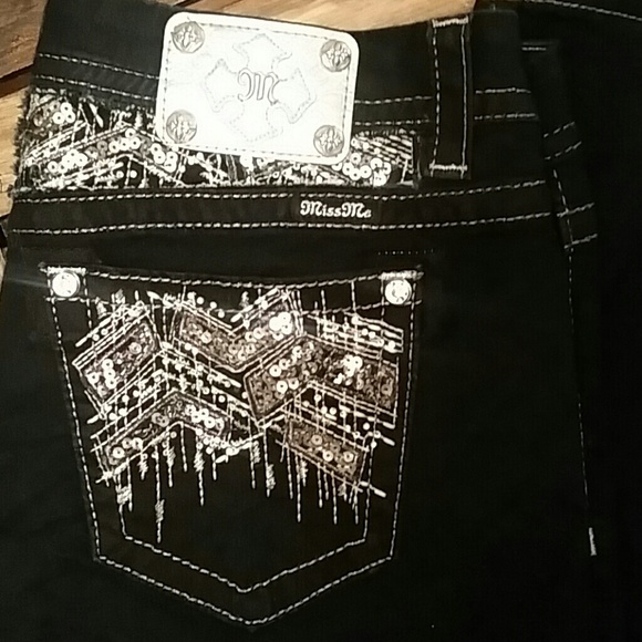 Women's size 31 mid-rise Easy Boot Miss me Jeans