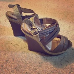 Tan and cream wedge heels.