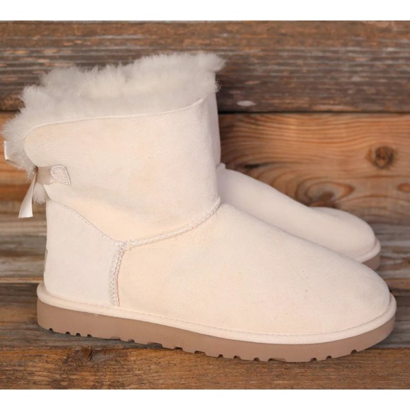 UGG Shoes - UGG Mini Bailey Bow Salt Sheepskin Boots US 9 NEW