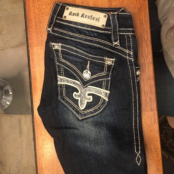 These are Rock Revival dark wash jeans.