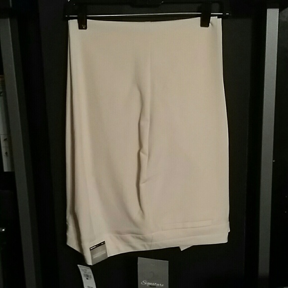Off white trousers.  Never worn