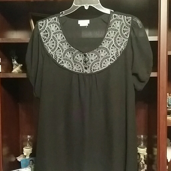 Sheer, loosely fitting blouse