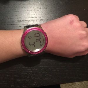 Betsy Johnson pink watch.