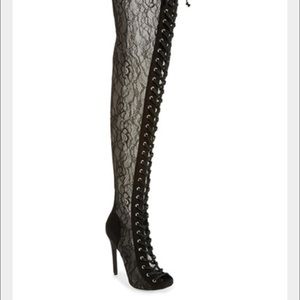 Black laced lace up booties.