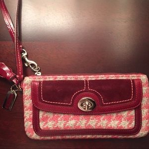 Coach pink and grey houndstooth wristlet