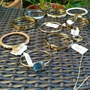 Various Michael Kors bracelets.