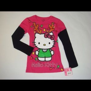 Hello Kitty T-shirt. Size S and Medium