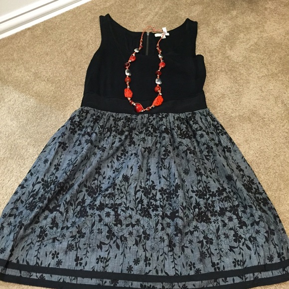 Dresses & Skirts - Black and gray dress. Fur vest
