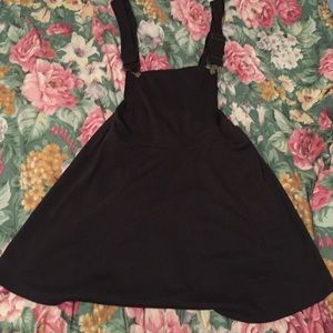 Black overall mini skater skirt
