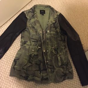Military with leather sleeves and studs jacket