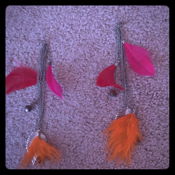 feather earrings. Never worn