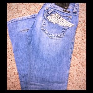 Size 28 boot cut light washed miss me jeans