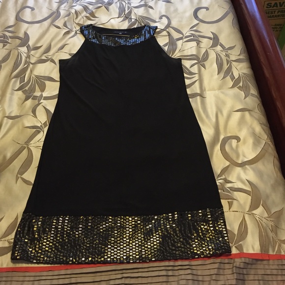 Black dress with gold snake skin trim detail