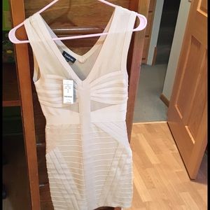 Bebe cream bodycon dress
