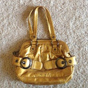 Golden yellow hand bag