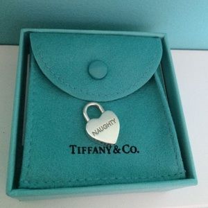 Naughty vs. Nice Tiffany lock charm.